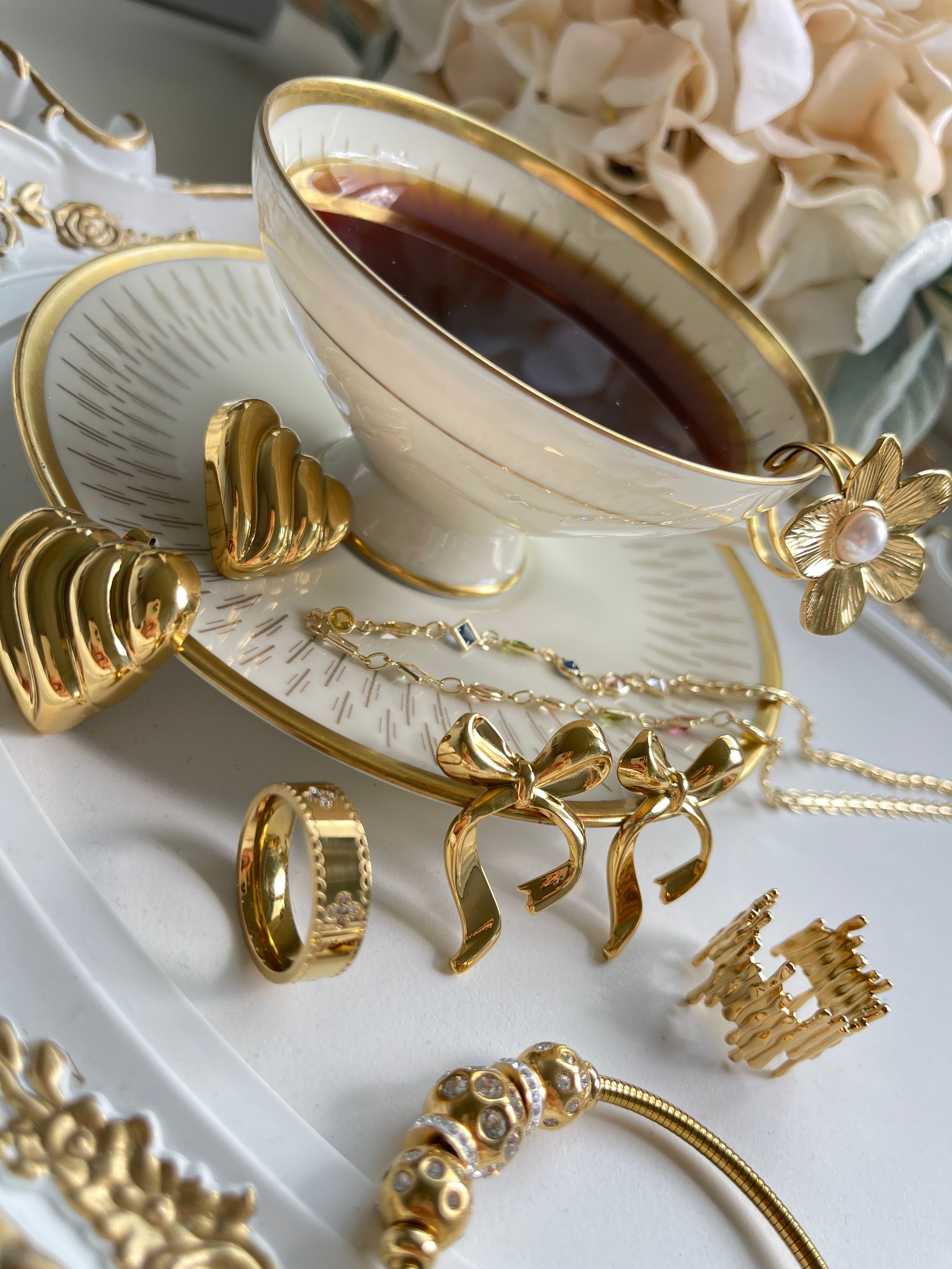 Goldene Herzklang-Ohrringe