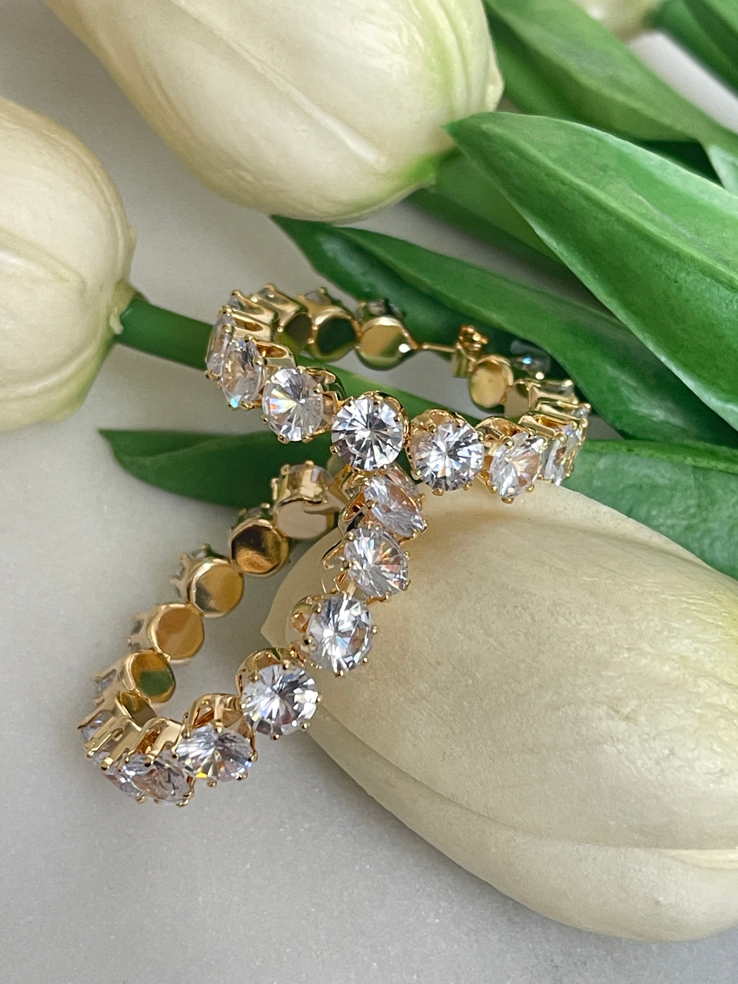 Boucles d'oreilles rondes à gros diamants