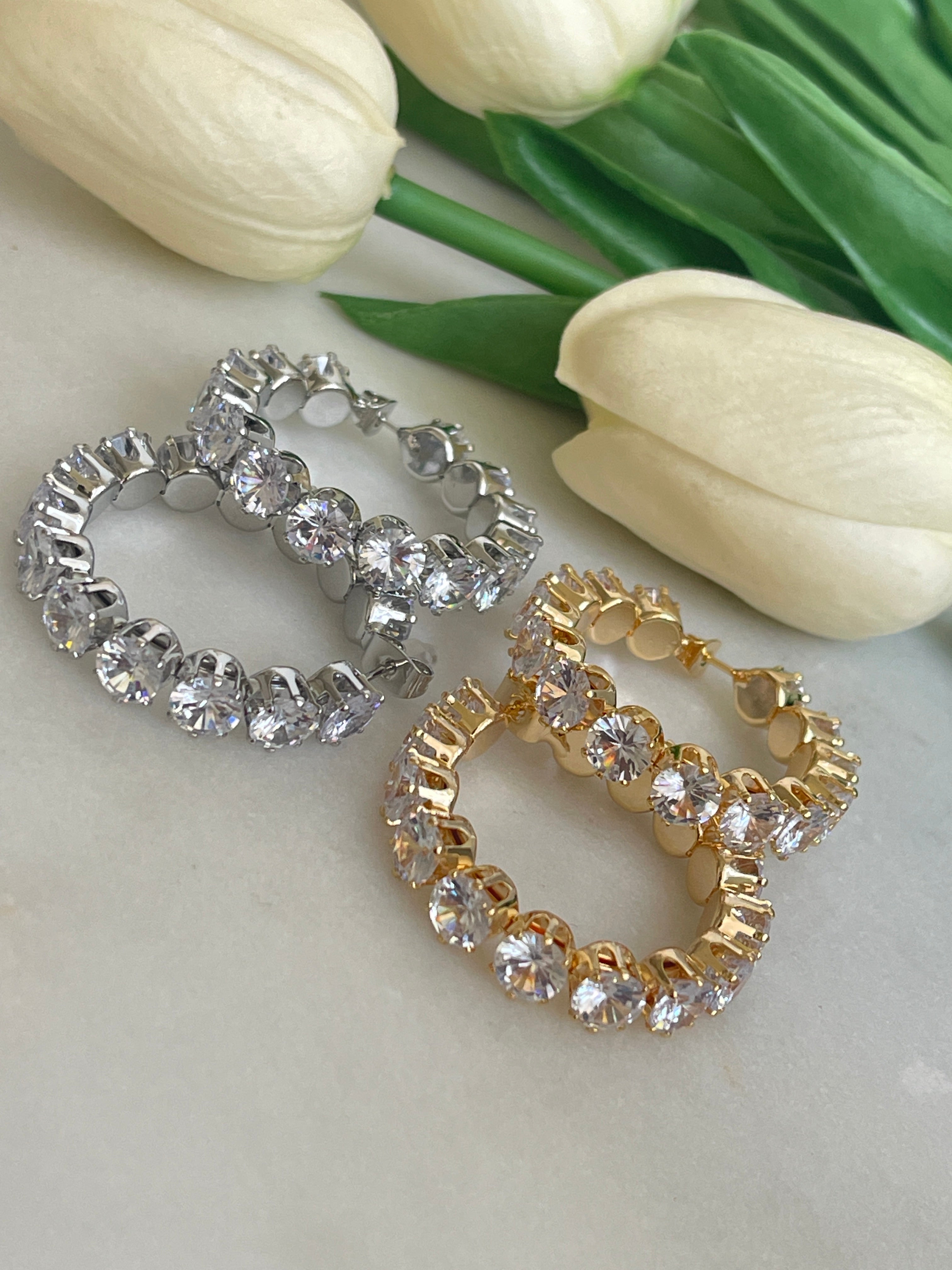 Boucles d'oreilles rondes à gros diamants