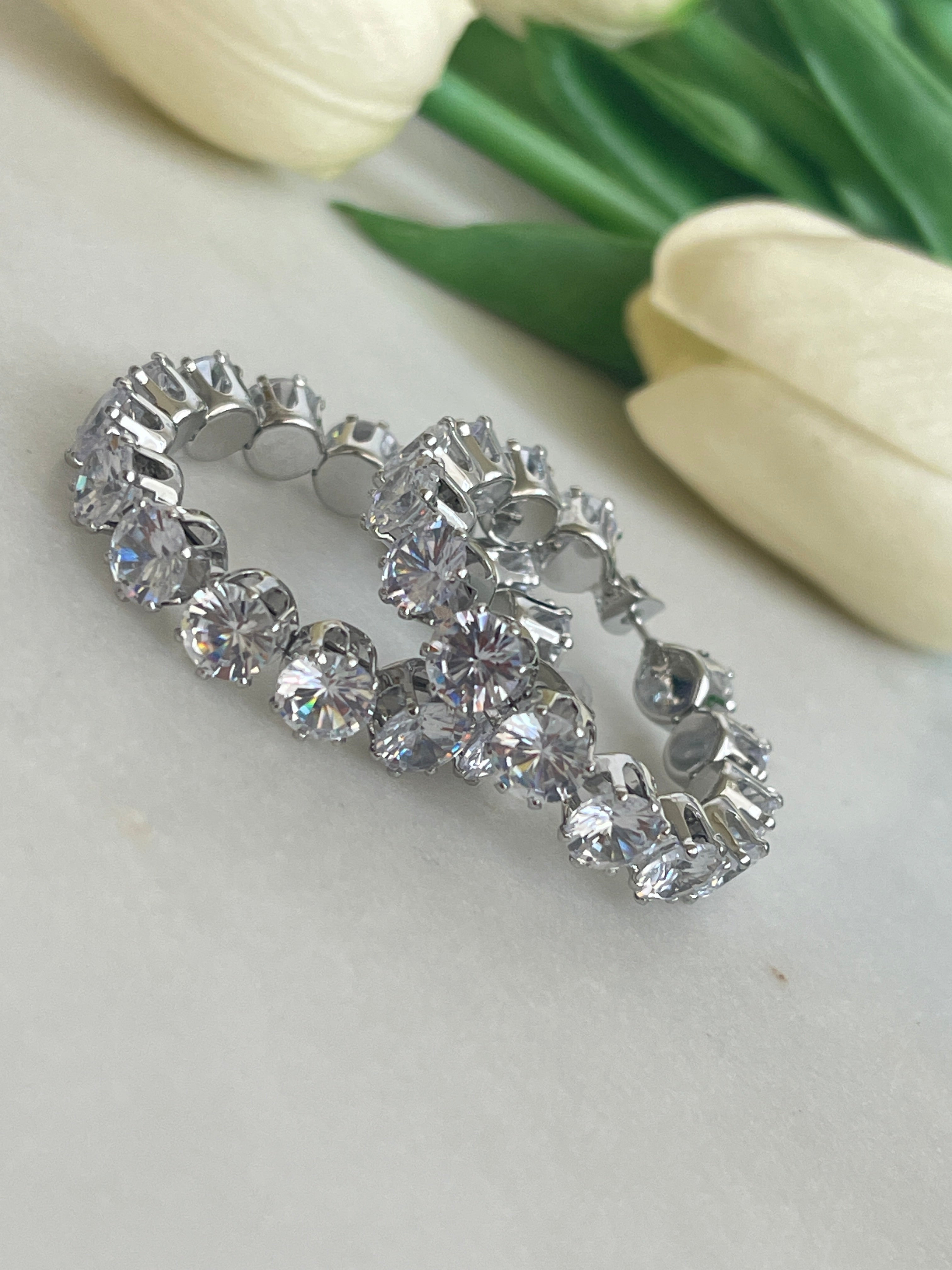 Boucles d'oreilles rondes à gros diamants