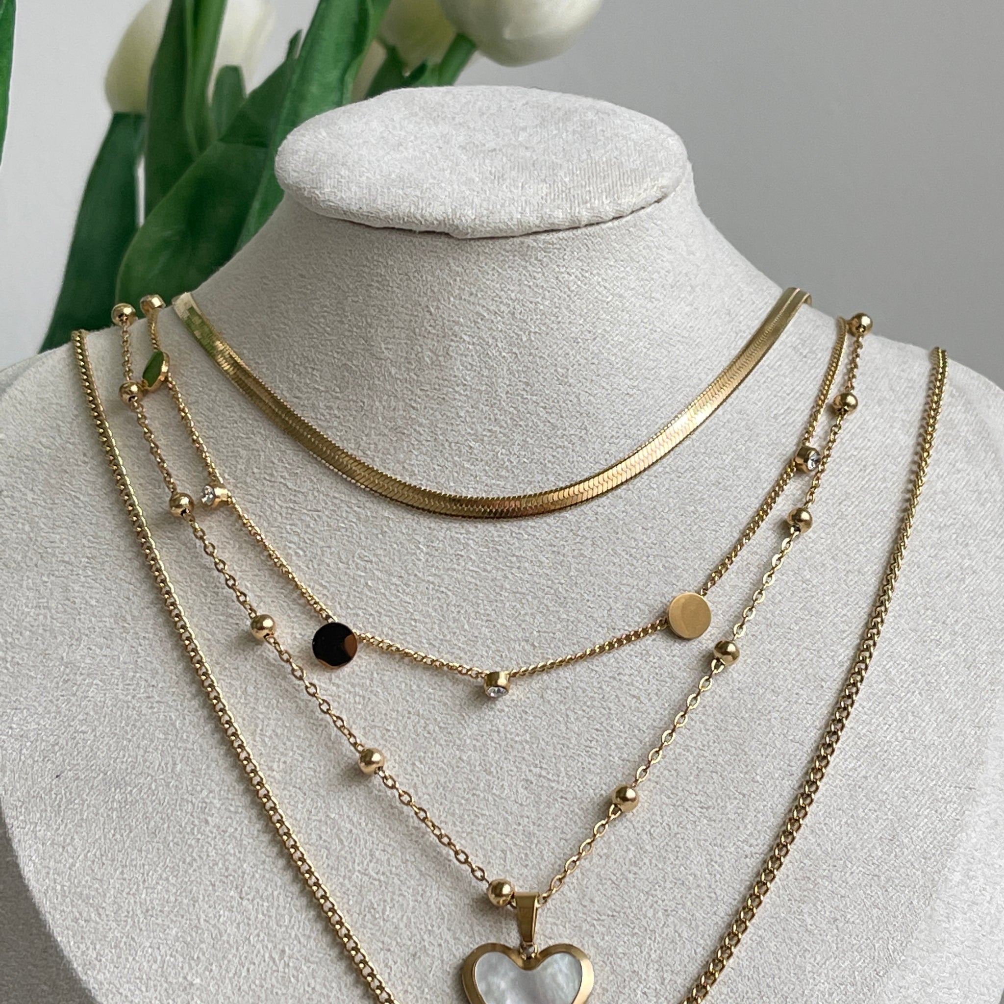 Multi-row heart necklace gold