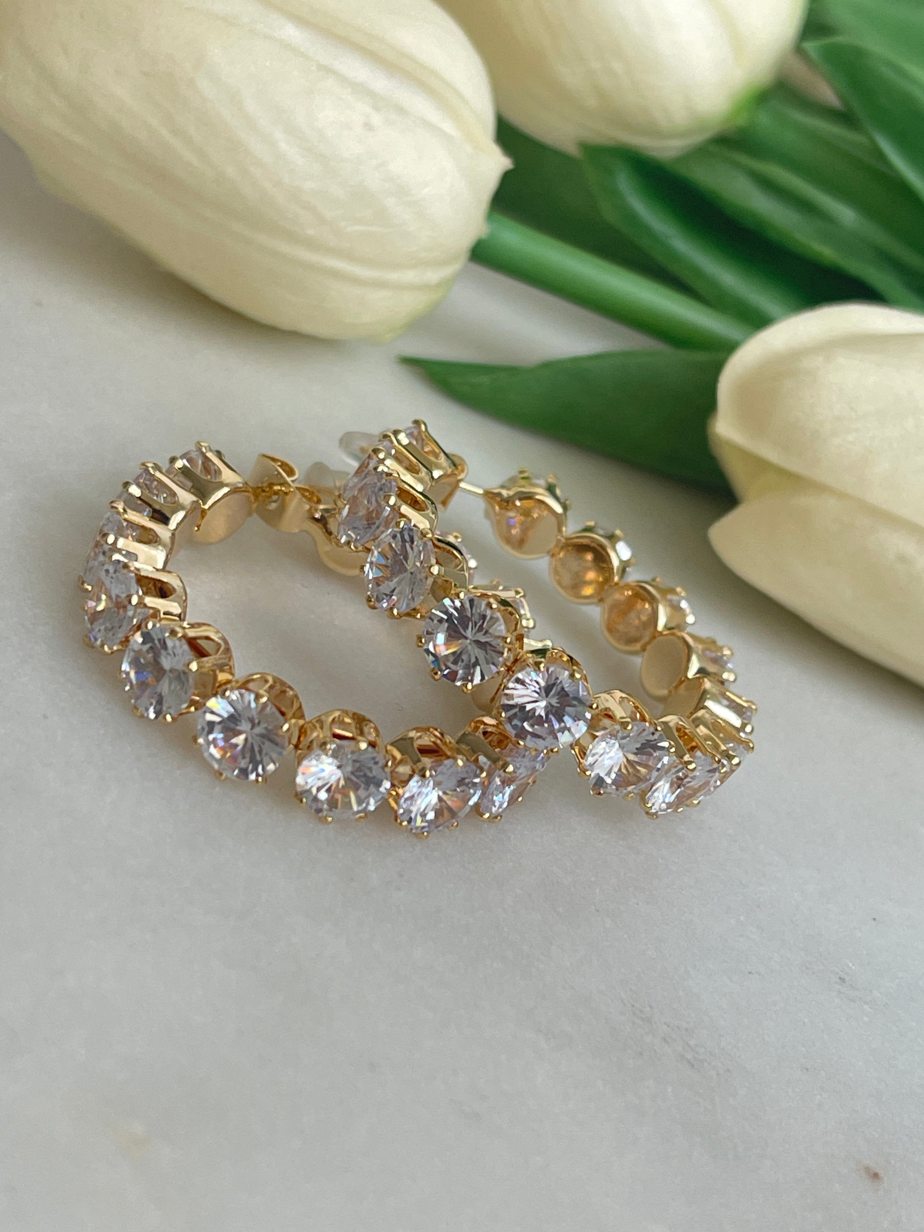 Boucles d'oreilles rondes à gros diamants